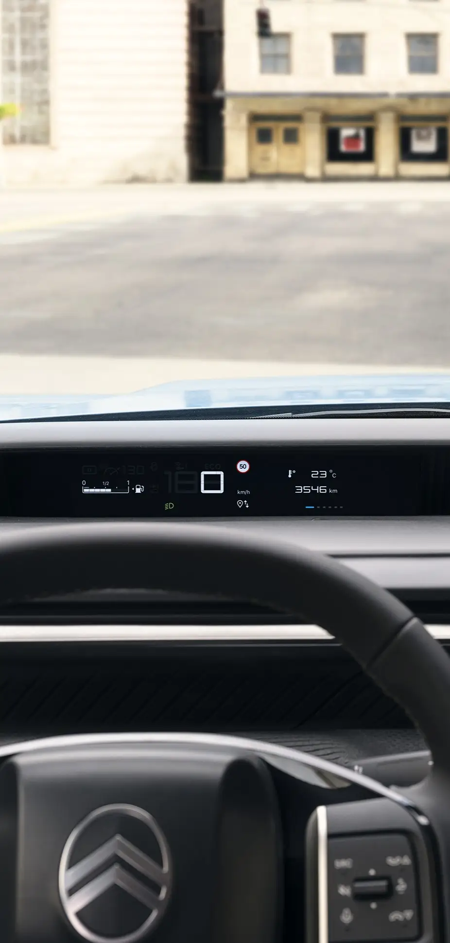 Driver‑view of Citroën C3 compact city car highlighting digital instrument panel and large touchscreen for intuitive, modern and affordable everyday driving.