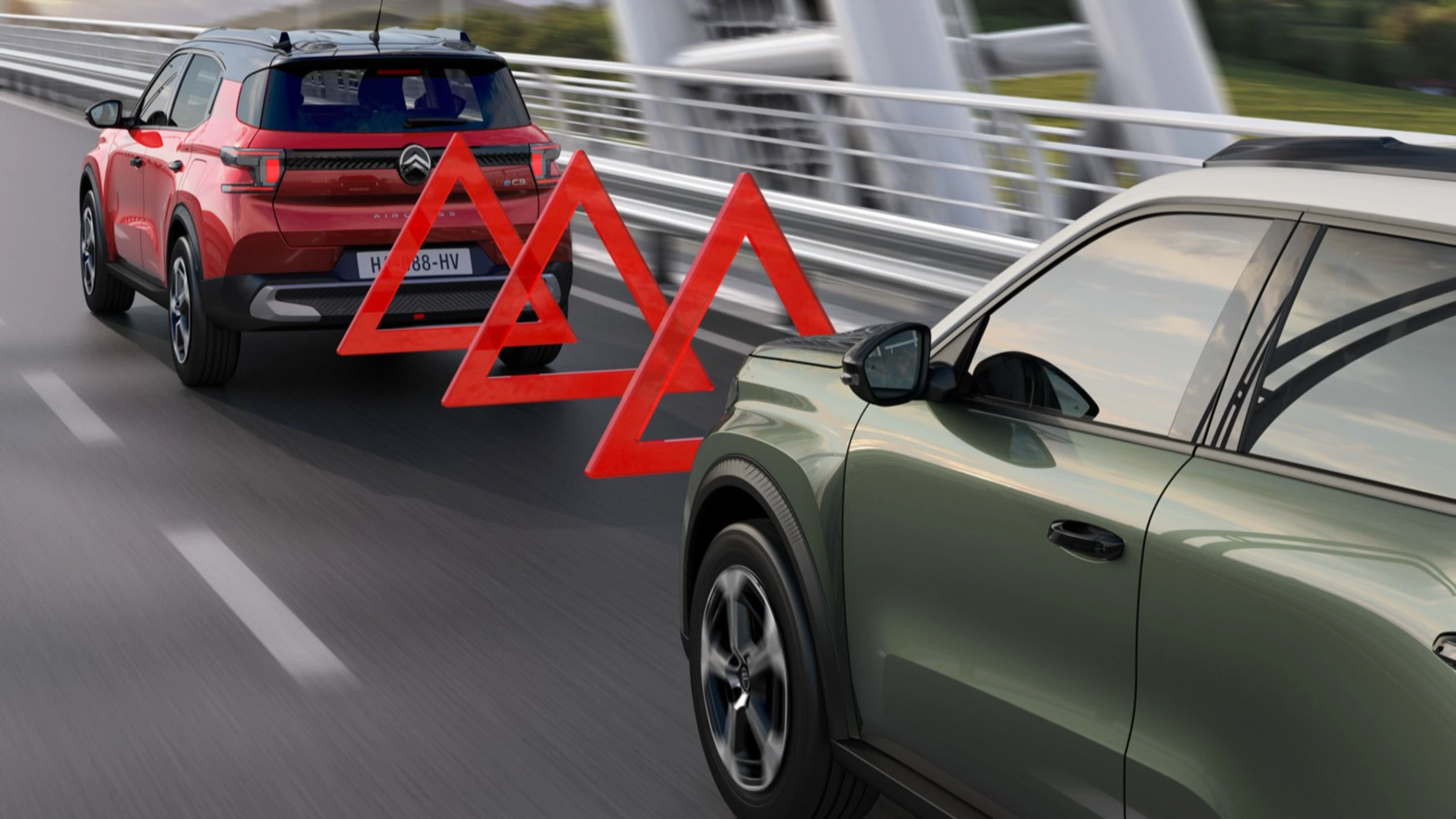 Highway view of Citroën C3 Aircross SUV showing forward collision alert for safer, confident and affordable everyday driving.