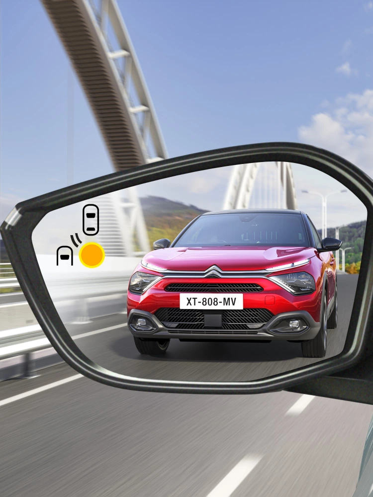 Mirror view C4 with Blind Spot Detection highlighting safety, visibility and technology for a premium confident drive