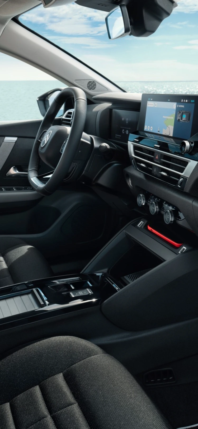 Front interior view ë-C4 highlighting high‑stance driving, connectivity, comfort and visibility for a modern experience