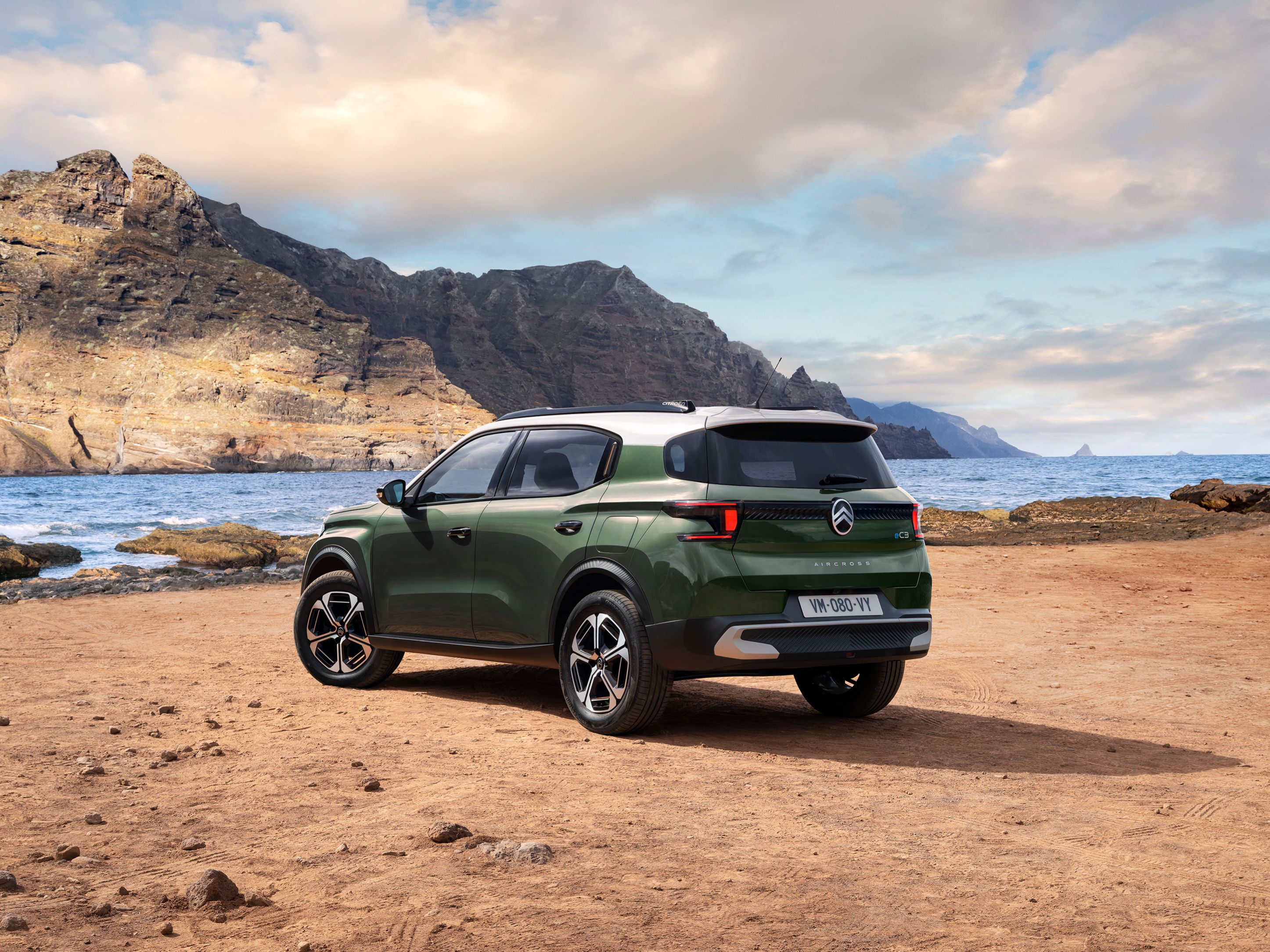 Rear three‑quarter seaside view of Citroën C3 Aircross SUV showcasing modern SUV design for versatile and affordable mobility.