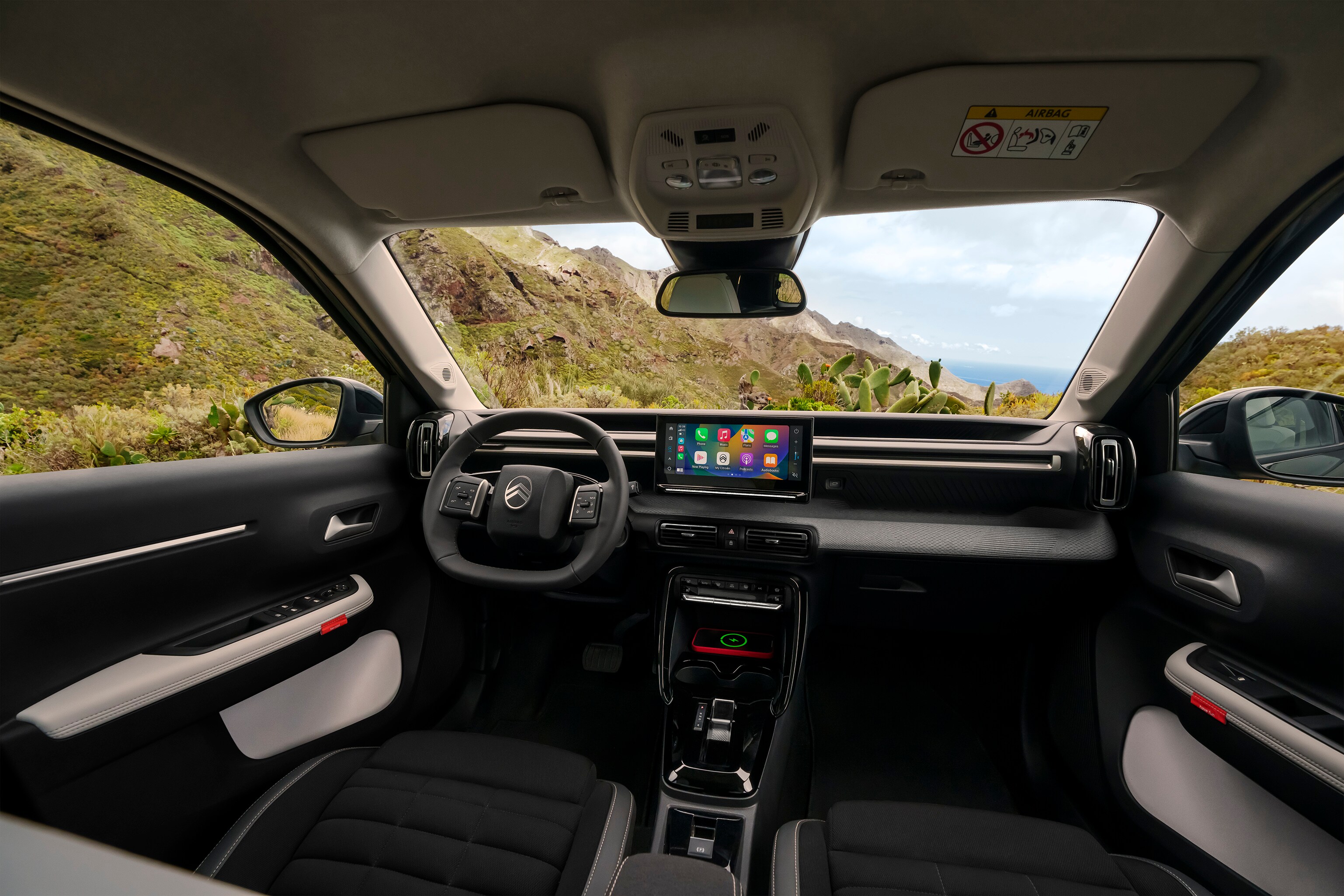 Front interior view of Citroën C3 Aircross SUV showcasing panoramic dashboard and large touchscreen for intuitive, spacious and affordable everyday driving.
