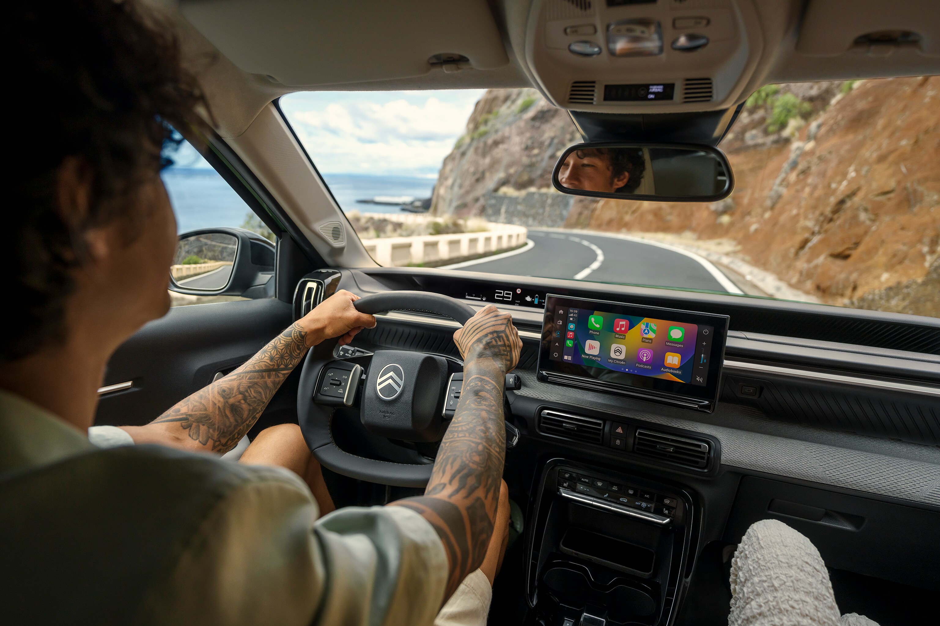 Driver‑view of Citroën C3 Aircross SUV highlighting large touchscreen and modern cockpit for intuitive, connected and affordable everyday driving.