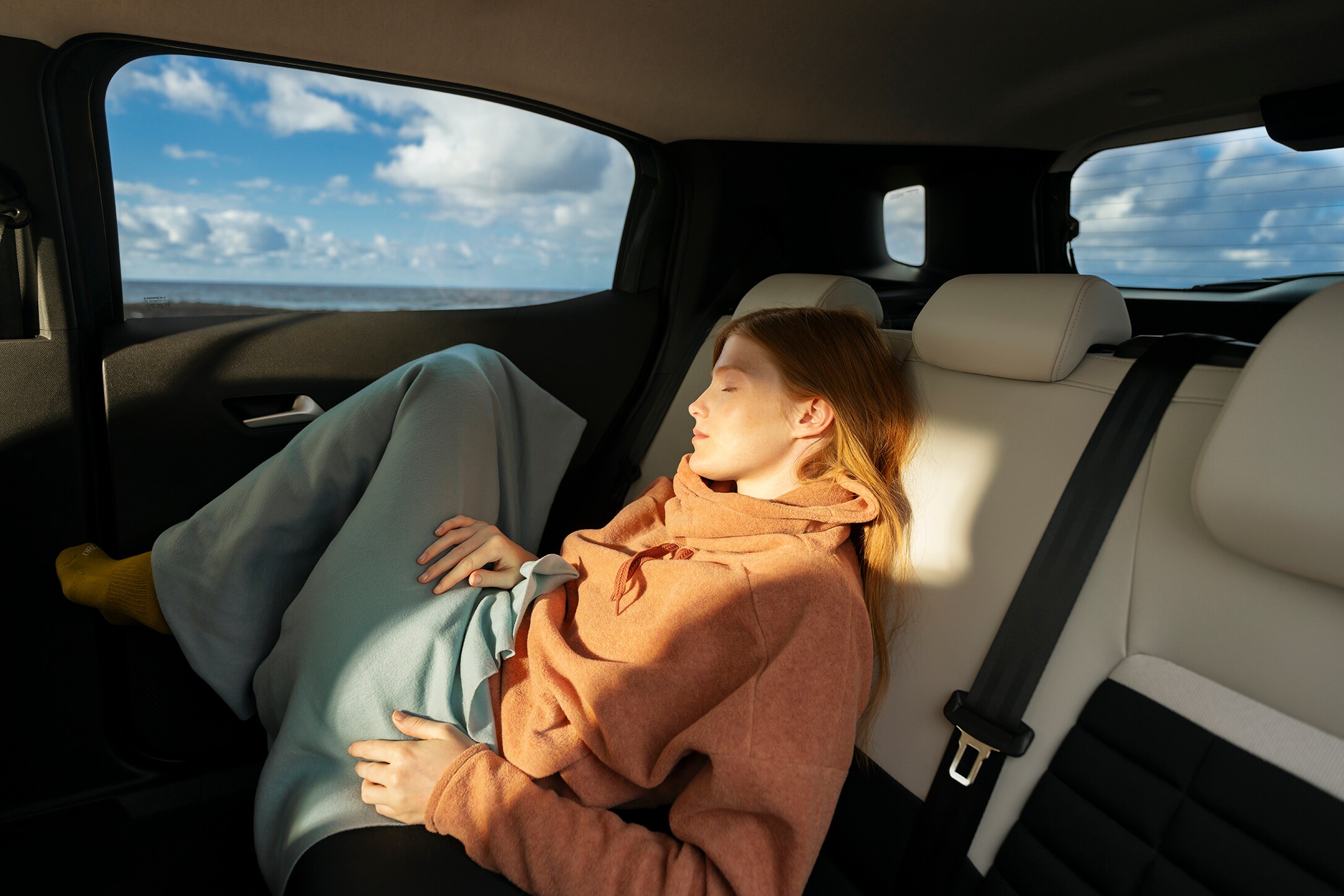 Rear interior view of Citroën C3 Aircross SUV showcasing spacious seating for relaxed long‑journey comfort and affordable everyday mobility.