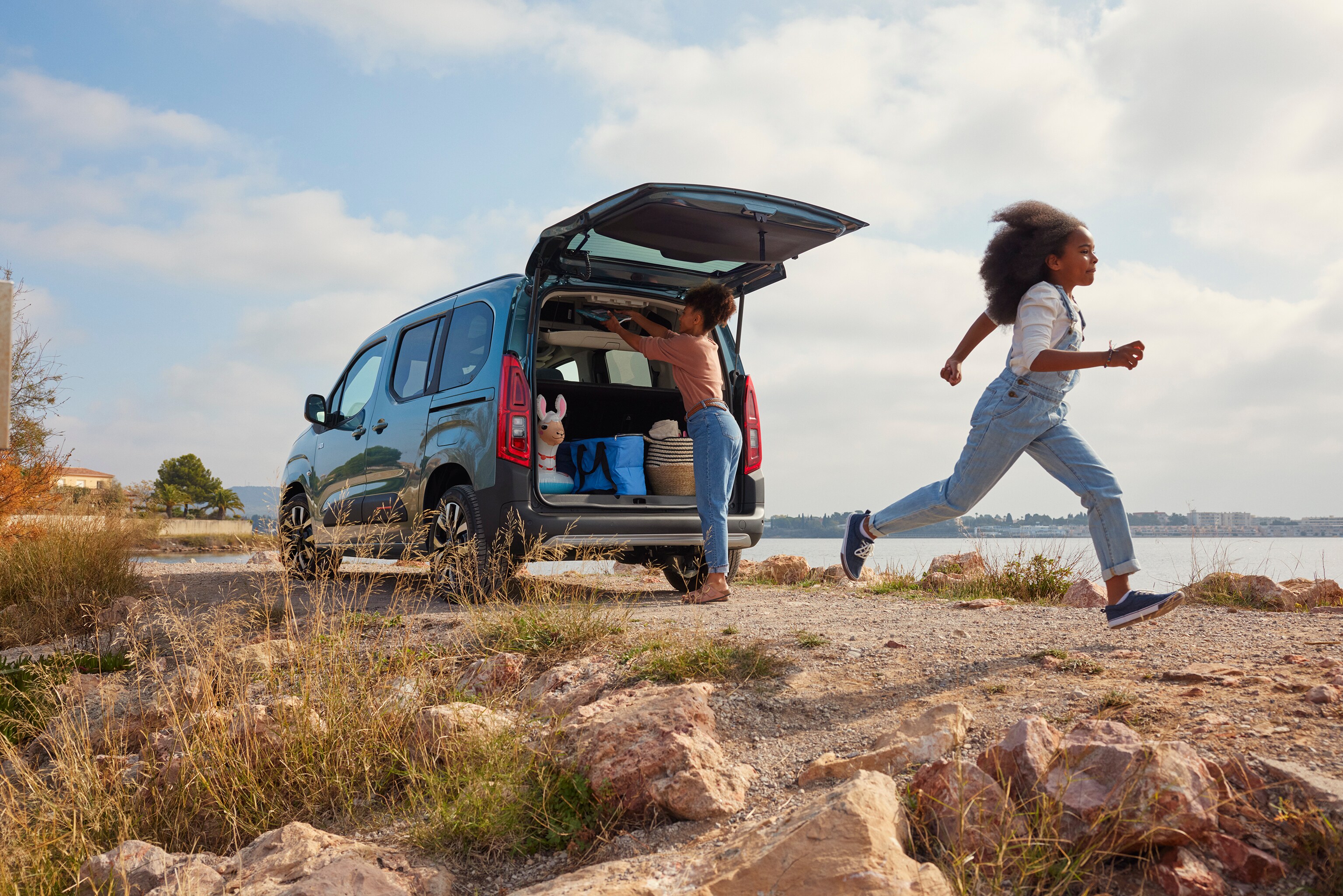 Rear three‑quarter view Berlingo highlighting large boot access, practicality, safety, efficiency and versatile family use