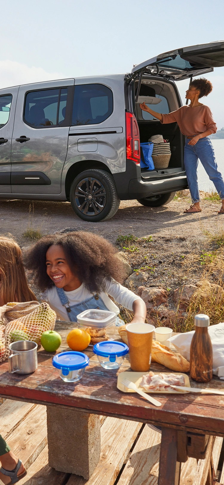 Side view Berlingo with open boot showing spacious loading area, practicality, safety, efficiency and confident family use